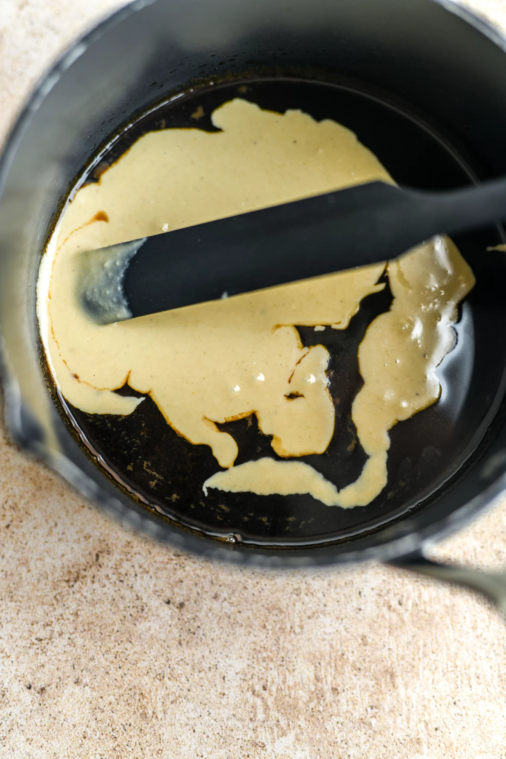 tahini added to saucepan