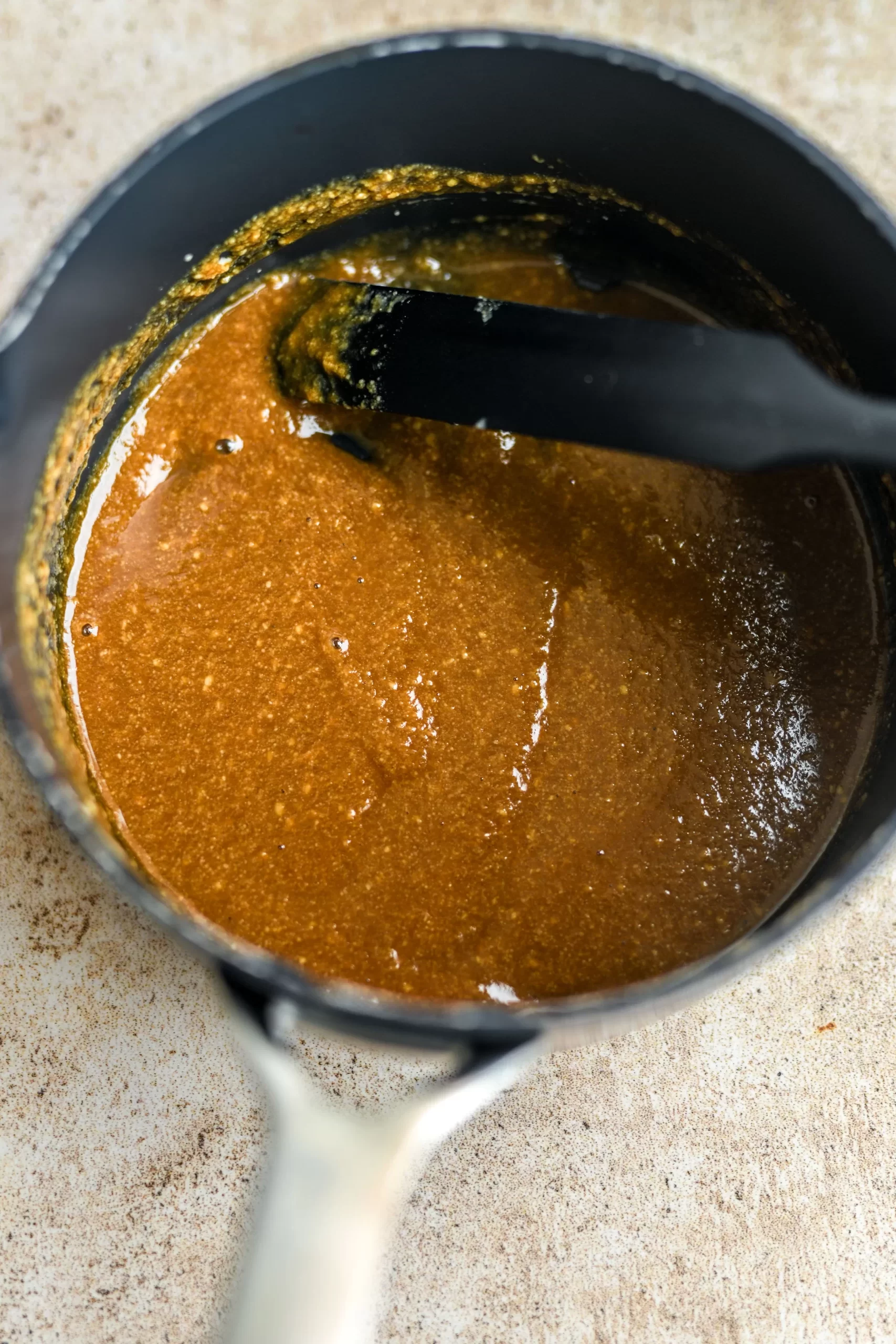 salted tahini caramel in sauce pan